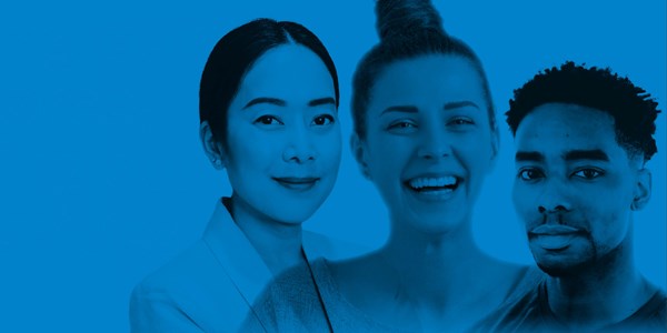Two women and one man smiling