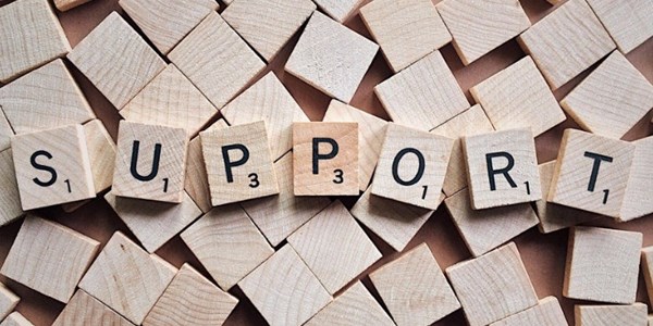 Blocks spelling out support